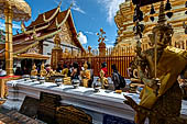 Chiang Mai - Wat Phra That Doi Suthep. The innercourtyard of the temple is filled with Buddha statues and other religious paraphenalia. 